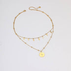 TWO LAYERED CROSS NECKLACE